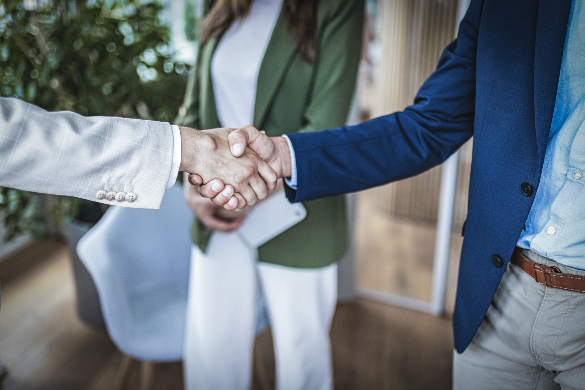 Shaking hands, thanking each other