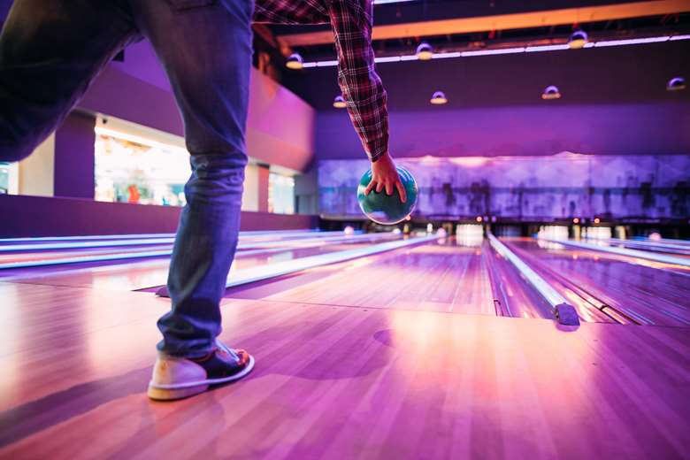 A person playing bowling